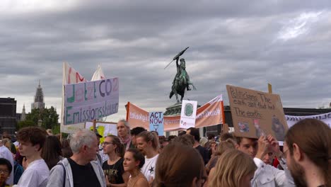 Signs-being-held-up-at-hero-square-during-fridays-for-future-climate-change-protests-SLOW-MOTION