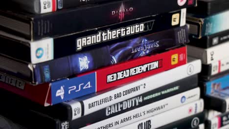 Slow-pan-of-some-videogames-cases-in-a-collection