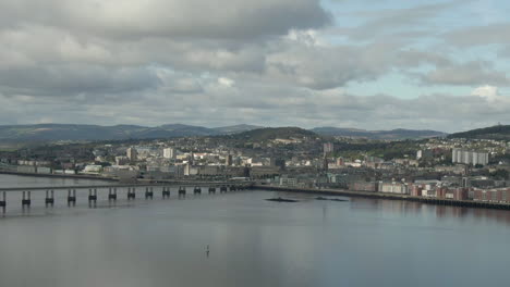 An-aerial-view-of-the-Tay-Road-bridge-and-Dundee-city-on-a-cloudy-day