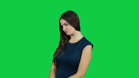 Shy-sad-girl-in-front-of-a-green-screen