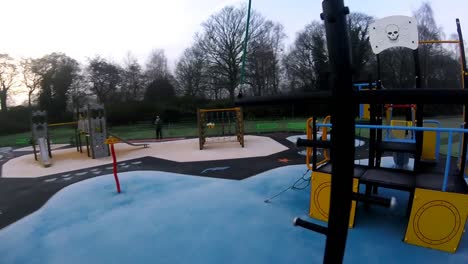 Recreational-colourful-children's-spooky-empty-playground-FPV-slow-motion-flying-aerial-view