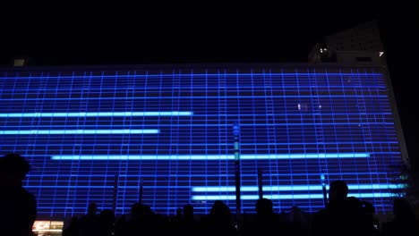 LED-light-show-on-facade-of-building-at-Glow-festival-in-Eindhoven,-Netherlands