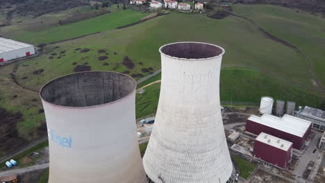 Aerial-dolly-out-of-Santa-Barbara-Enel-power-station-cooling-towers