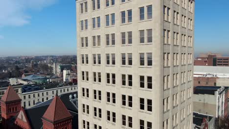 Rising-aerial-of-Griest-Building,-Central-Market,-Visitors-Center-in-Lancaster-PA-under-blue-sky