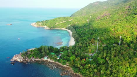 Secret-Beach-Koh-Phangan-Thailand,-aerial-panorama-of-tropical-island-with-jungle