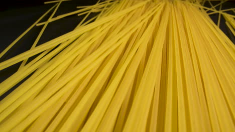 Close-up-of-uncooked-spaghetti-strands