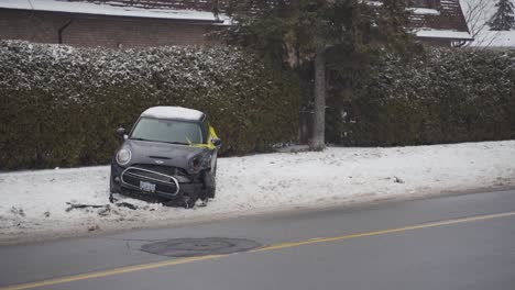 View-of-a-crashed-car-fender-bender-in-the-snow