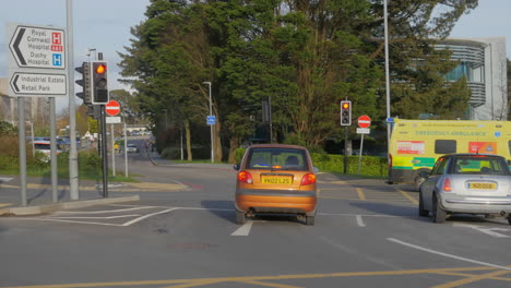 Cars-Stopped-To-Give-Way-To-The-Ambulance-From-Royal-Cornwall-Hospital-In-Treliske,-Truro,-Cornwall,-Wide-Shot