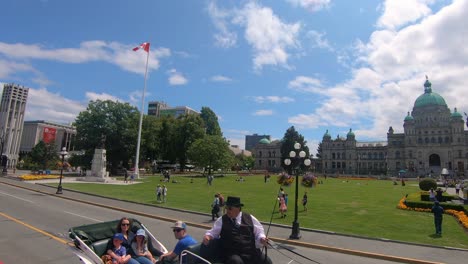 Driving-on-street-with-a-look-to-Parliament-building-in-Victoria-in-Canada