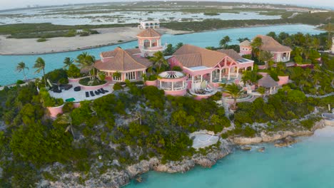 Tropical-Island-Turks-And-Caicos-Aerial-Drone,-Beautiful-Resorts,-blue-sea-and-palm-trees