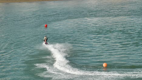 Jetski-expert-on-a-difficult-course-attacks-the-turns-with-speed---slow-motion