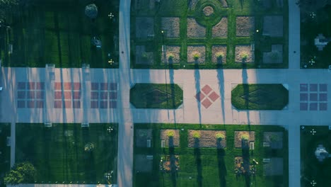 Aerial-top-down-drone-shot-of-symmetrical-sidewalks-and-trees-in-Civic-Park-Denver