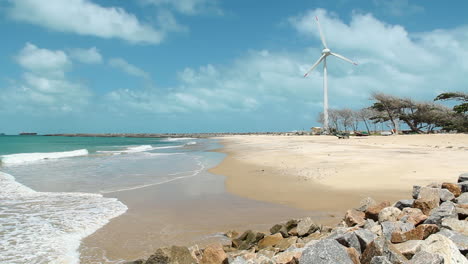 Windmill-and-Beach-with-wind-energy-in-Fortaleza,-Cear?