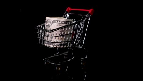 Dollar-currency-spending-from-retail-market-trolley