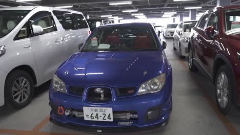Arc-Shot-of-a-Blue-Subaru-WRX-STI-Performance-Sedan-Car