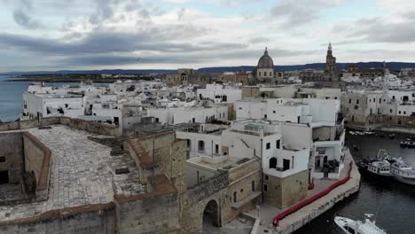 Drone-slowly-flies-over-Monopoli-castle-and-the-old-city-during-the-dawn
