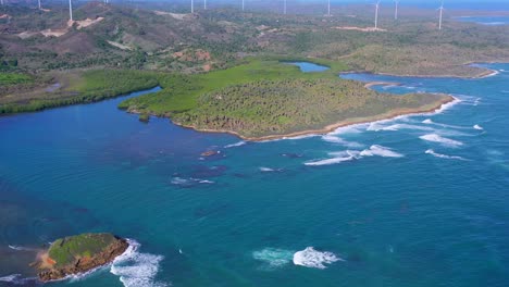 Aerial-view-of-coast-near-Maimon-with-wind-turbines-in-background