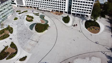Aerial-birds-eye-view-of-renovated-Unity-Square-with-tiny-small-people-walking-on