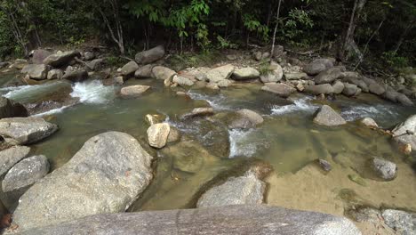 Very-relaxing-tropical-water-stream-at-Ulu-Bendul,-Malaysia,-Negeri-Sembilan