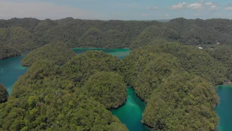 Hermoso-Dron-Aéreo-Disparado-Sobre-El-Parque-Natural-De-Sohoton-En-La-Isla-De-Siargao,-Filipinas