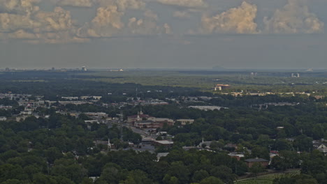 Marietta-Georgia-Aerial-v5-pan-right-shot-of-Sandy-Springs-cityscape-and-airport-during-daytime---DJI-Inspire-2,-X7,-6k---August-2020