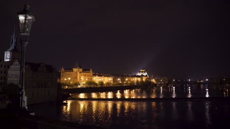 National-theatre-in-Prague,Czechia,at-night,behind-bridges-over-Vltava-river