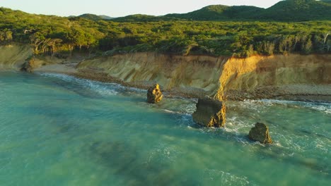 Popa-beach-cliffs-in-Dominican-Republic.-Aerial-circling