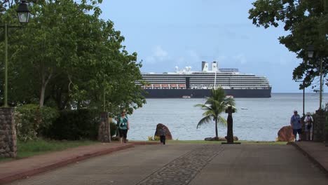 Cruise-ship-in-Taiohae-Bay-viewed-from-the-entrance-of-Notre-Dame-Cathedral,-Nuku-Hiva,-French-Polynesia