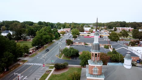 Aerial-Matthews-NC,-Matthews-North-Carolina-with-First-Baptist-Church-Steeple-in-Background-in-4k