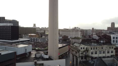 Aerial-rising-view-iconic-Liverpool-landmark-St-Johns-beacon-empty-city-skyline-during-coronavirus-pandemic