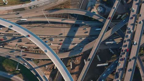Aerial-of-cars-on-59-South-and-610-South-loop-freeway-in-Houston,-Texas