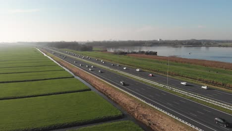 European-highway-traffic-in-countryside,-inter-city-connection,-aerial-view