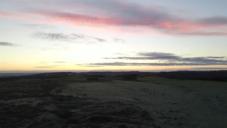 Drone-footage-of-a-frozen-moorland-at-dawn