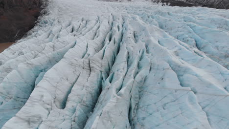 Tilt-Up-Aerial-View,-Svinafellsjokull-Glacier,-Iceland