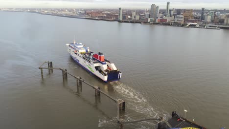 Stena-Line-logistics-ship-leaving-river-Mersey-port-aerial-view-Birkenhead-Liverpool-harbour-city-landscape