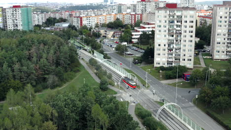 Aerial-Shot-Of-Tram-Travelling-In-Prague-City-Center,-Streets-Empty-Due-To-Coronavirus-Pandemic