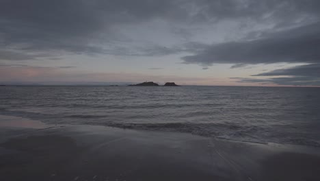 Beautiful-wide-angle-view-of-scottish-beach-during-sunrise-moment-of-the-day