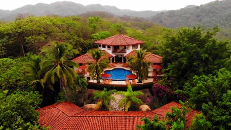 Aerial-shot-lowering-camera-view-of-a-beautiful-resort-and-spa-in-Tamarindo-Costa-Rica