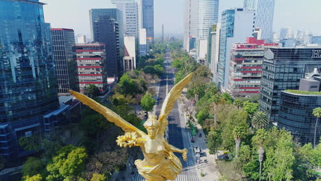 Aerial-drone-footage-of-the-Independence-Monument-in-Mexico-City-showing-the-statue-of-the-Angel-de-la-Independencia-and-the-Reforma-Avenue