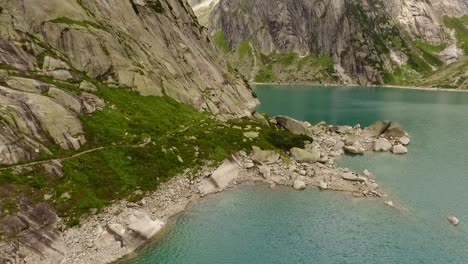mountain-lake-in-the-swiss-alps,-reservoir-in-the-middle-of-the-mountains