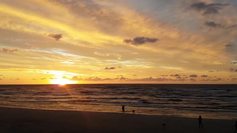 Sunset-at-the-beach,-Baltic-Sea,-Lubiatowo,-Poland