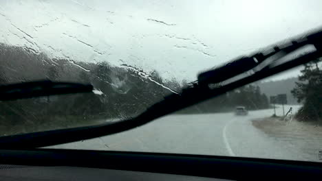 The-rain-falling-down-on-the-car-while-driving-through-the-united-states