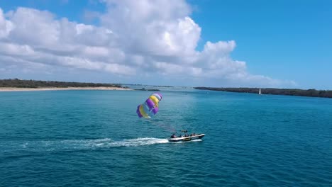 Older-adventure-seeking-people-parasailing-to-get-a-adrenaline-rush