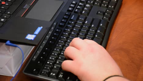 Woman-typing-on-keyboard-close-up