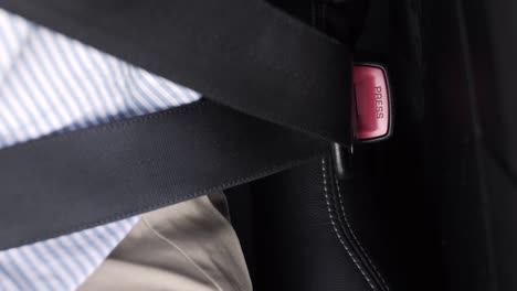 Fastening-the-seatbelt-in-a-car,-safety-first