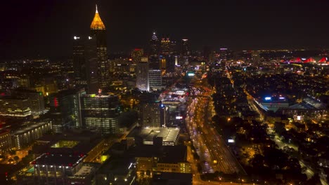 High-altitude-time-lapse-shot-at-night-from-a-drone-looking-south-into-Midtown-and-Downtown-Atlanta