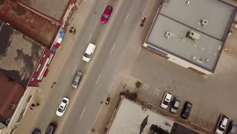 Drone-flying-over-a-town's-main-street