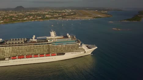 Aerial-close-up-view-of-the-side-on-the-cruise-ship-sailing-in-the-water-4K