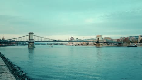 A-still-image-of-the-Chain-Bridge-and-its-traffic-near-the-shore