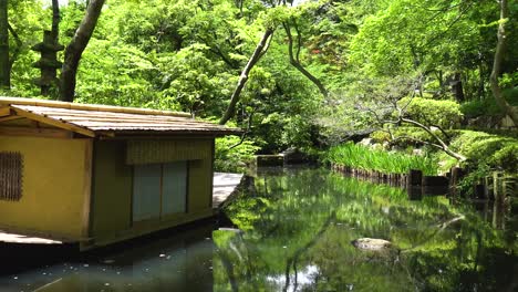 Traditional-japanese-garden-with-lake-and-boat